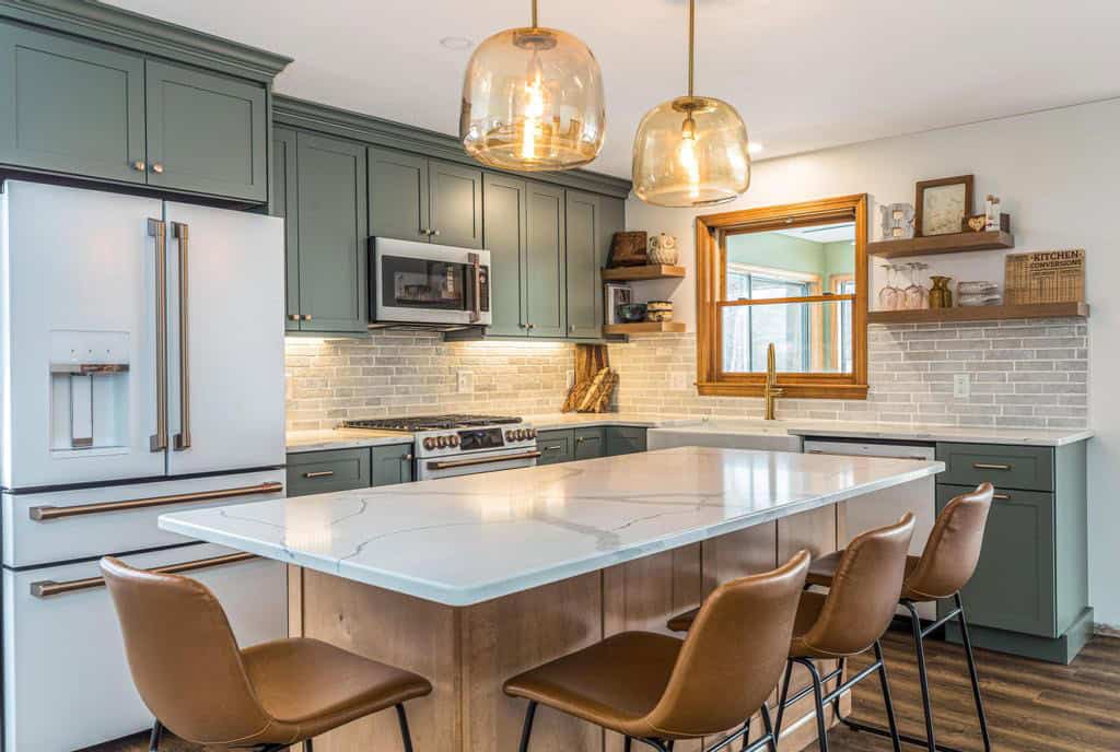 Decorative fixtures and accent lighting highlighting kitchen design features