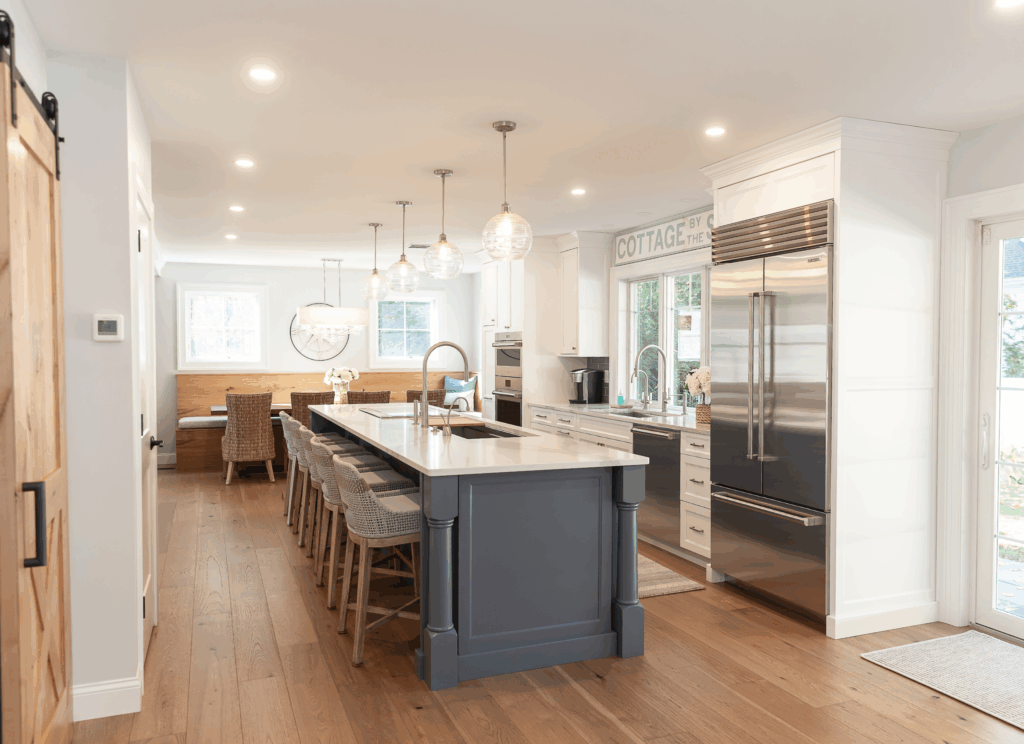Modern open concept kitchen with large island in New Hampshire home